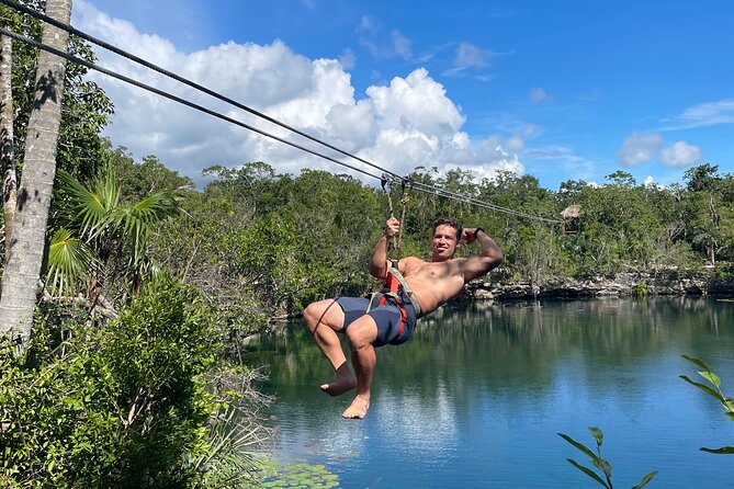 4 Private Cenotes, Zip-Lines, Canoes & Mayan Village with Delicious Lunch - Zip-lines and cliff jumps add the rush