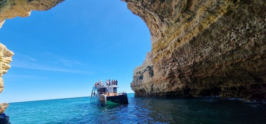 Albufeira: Coastline and Benagil Caves Tour by Catamaran - Galé and Salgados: long views and open water