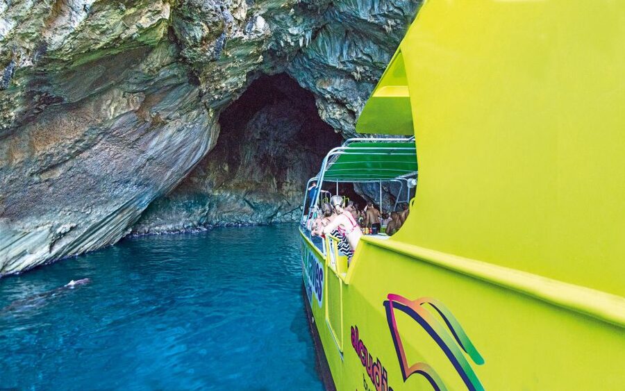 Alcudia: Caves & Coastline Boat Trip w/ Snorkelling - Entering the marine caves