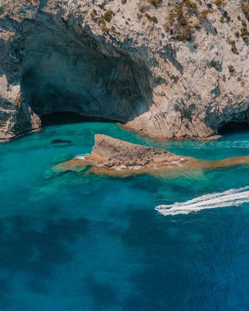 Alcudia: JetSki Tour Coll Baix beach & Caves (free Photos) - Guide quality and safety