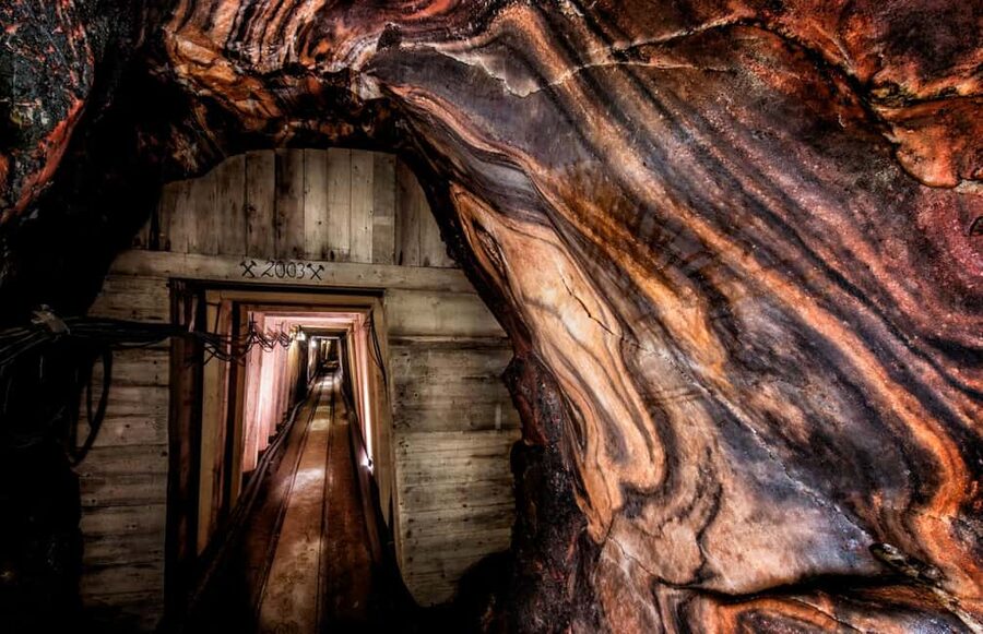 All-Inclusive Tour Salzwelten Altaussee: Shuttle & Salt Mine - Salt walls, tools, and multimedia displays
