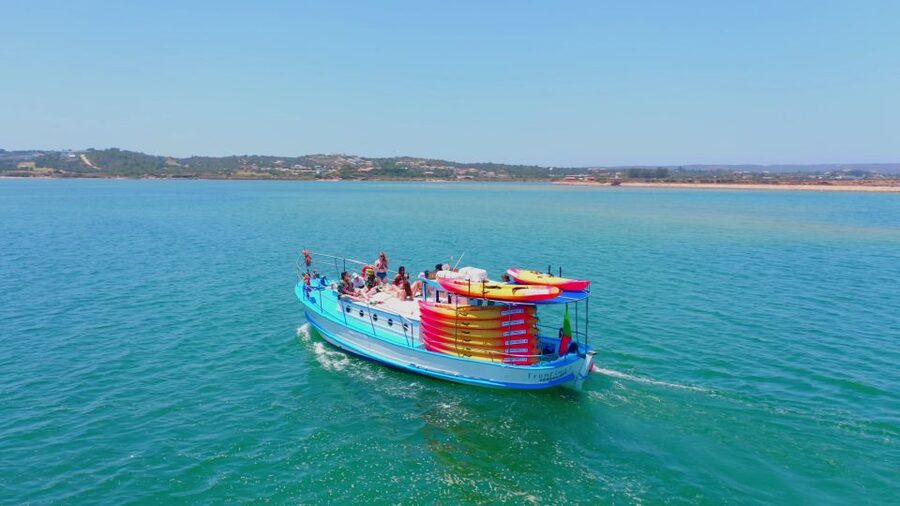 Alvor: Explore Caves Boat and Kayak Tour - Swimming from the boat
