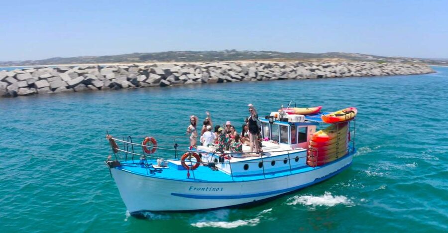 Alvor: Explore Caves Boat and Kayak Tour - Cruising toward Praia do Vau