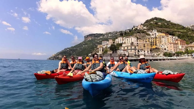 Amalfi: Kayak-Snorkel to Pandora Cave, Hidden Beach & Drinks - Paddling past the coastal forts