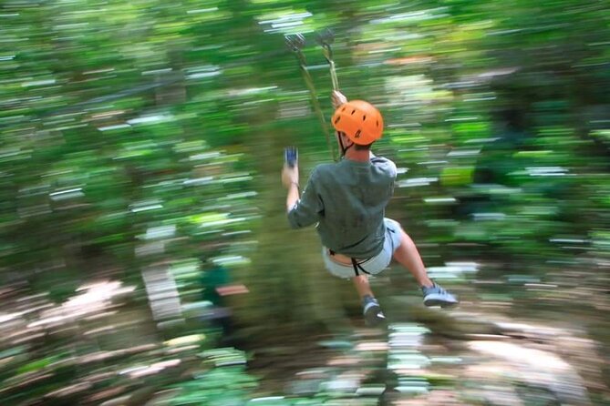 ATV Cenote and Zipline Sacred Jungle Expedition - Ziplining above the jungle canopy