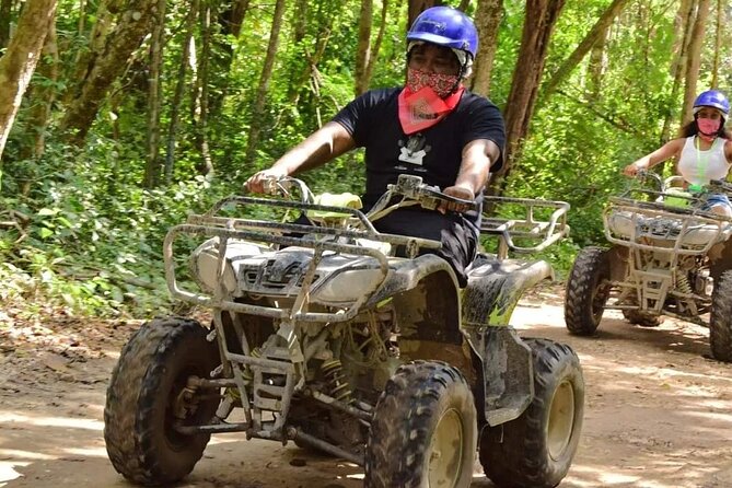 ATV Cenote and Zipline Sacred Jungle Expedition - Cooling off in a cave cenote