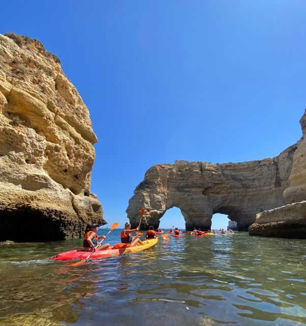 Benagil: Caves, Coves & Secret Beaches Guided Kayaking Tour - Paddling beneath the Benagil cliffs