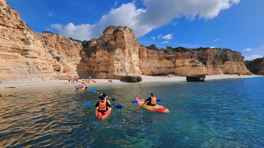 Benagil: Sunrise kayak tour Benagil caves and secret spots - Paddling past cliffs and secret coves