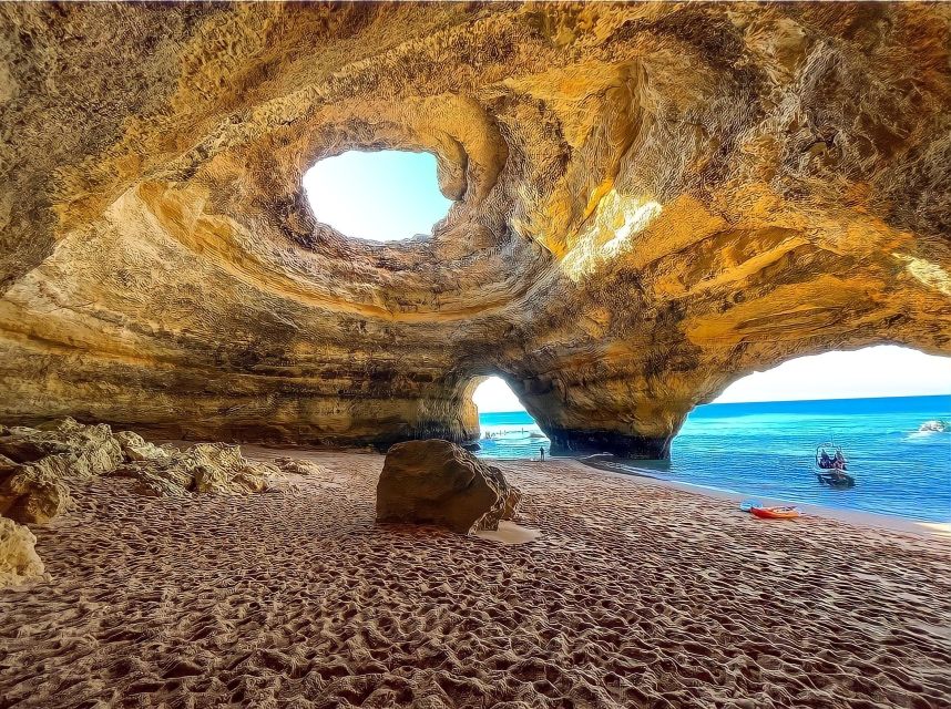 Benagil: Sunrise kayak tour Benagil caves and secret spots - A swim stop near the cliffs