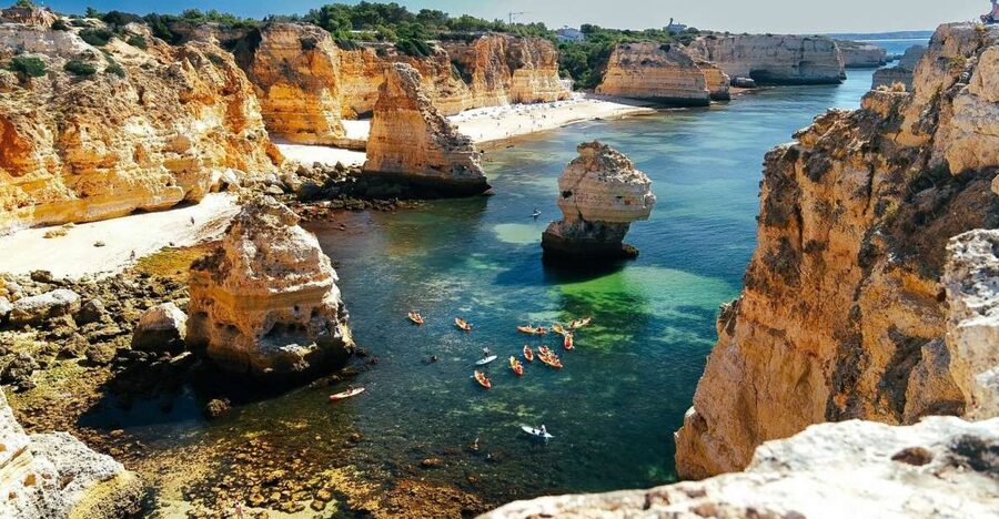 Benagil: Sunrise kayak tour Benagil caves and secret spots - Starting at O Litoral near Casa Mar