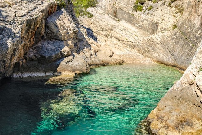 Blue cave group tour with swimming and snorkelling from Hvar - Stiniva Cove and its dramatic cliffs