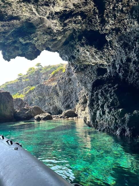 Boat Tour: Island hopping by dinghy with cave visits and snorkeling - Meeting at the Cristoforo Colombo seafront
