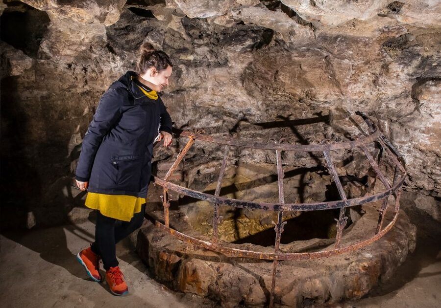 Budapest: Buda Castle Cave Tour - Entering the limestone world beneath Buda Castle