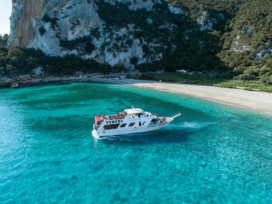 Cala Gonone: Grotta Bue Marino & Cala Luna Beach Boat Trip - Cala Luna, sand, caves, and a freshwater pond