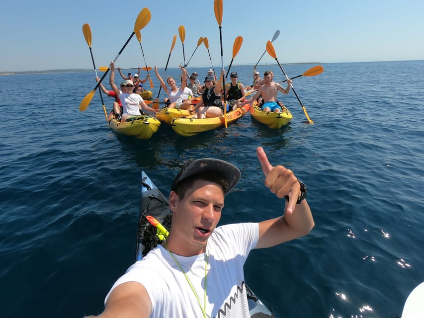 Cape Kamenjak: Kayak Tour with Cave Experience - Cliff jumping, with no pressure to perform