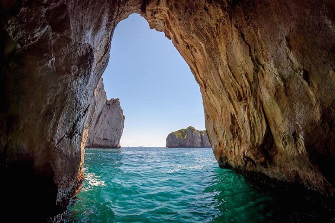 Capri Boat Tour from Sorrento: Swim, Grottos & Light Lunch - Drinks, snacks, and the return cruise