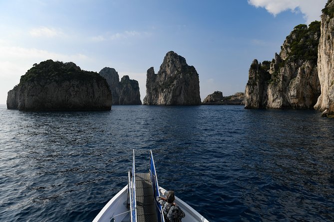 Capri Coast to Coast: Boat Tour with Optional Blue Grotto - The first caves: Marvellous, White, and Green Grotto