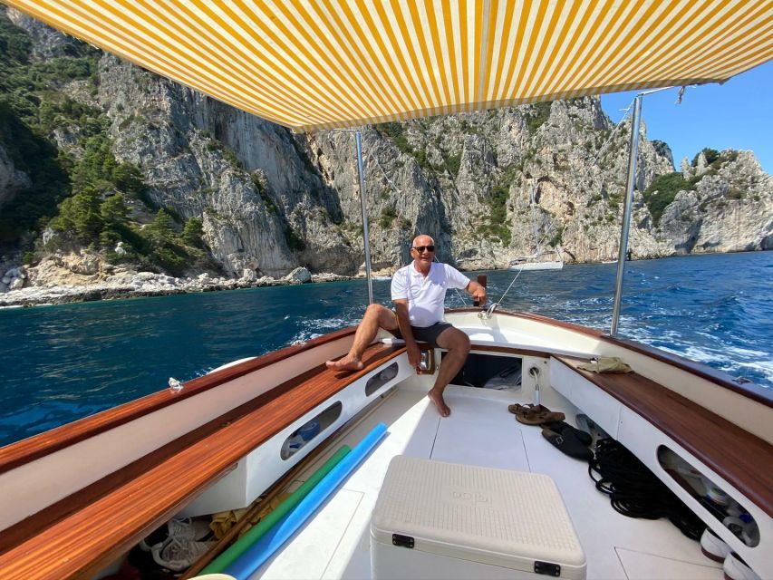 Capri: Island and Grottos Boat Cruise with Snacks and Drinks - The Faraglioni and Arch of Love