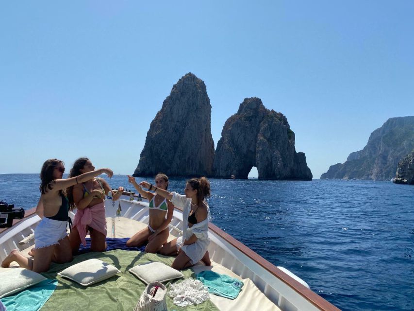 Capri: Island and Grottos Boat Cruise with Snacks and Drinks - Snacks, drinks, and limoncello