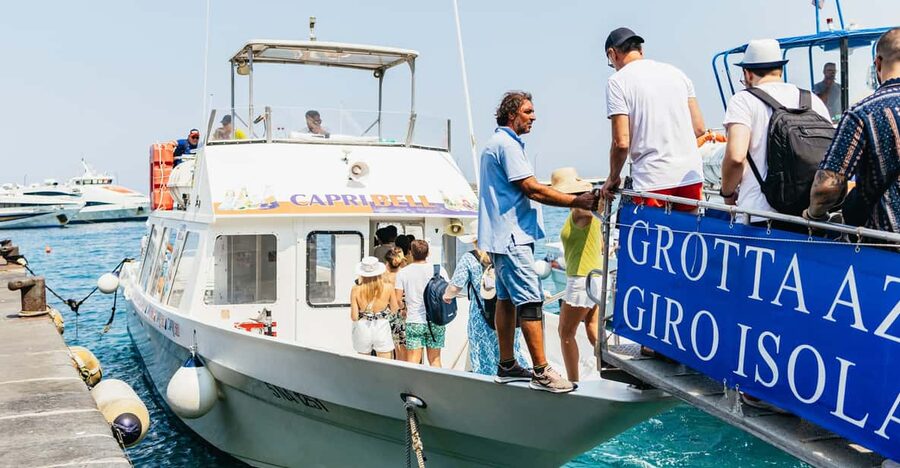 Capri: Island Boat Tour and Optional Blue Grotto Visit - Tiberius’s Leap and the cliffs below Villa Jovis