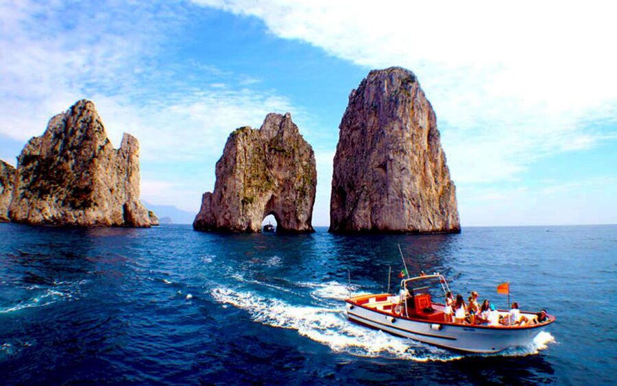 Capri: Island Boat Tour with Blue Grotto Stop - Marina Grande boarding and the first views