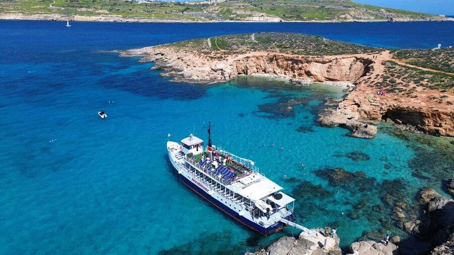 Comino: Blue Lagoon & Caves Boat Cruise - Food, drinks, and the famous pineapple cocktail