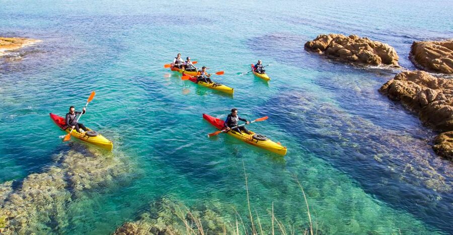 Costa Brava: Sea Caves Kayaking and Snorkeling Tour - Arriving at the beach and getting ready