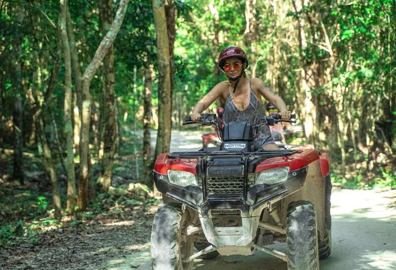 Cozumel: ATV Ride to Jade Cavern, Beach Club Access & Lunch - Riding an ATV through the jungle to Jade Cavern