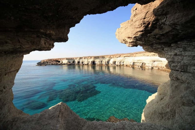 East Coast National Park: Half-Day Caves Jeep Safari - Sea caves, cliffs, and clear coastal water