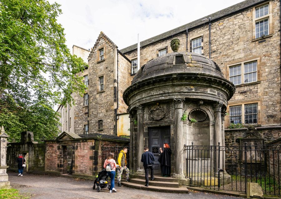 Edinburgh: Haunted Underground Vaults and Graveyard Tour - Walking through Edinburgh’s darker past
