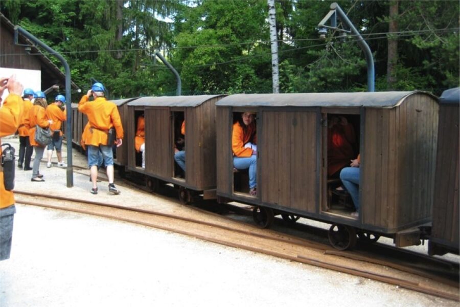 From Bled: Full-Day Underground Kayaking - Riding the old mining train underground