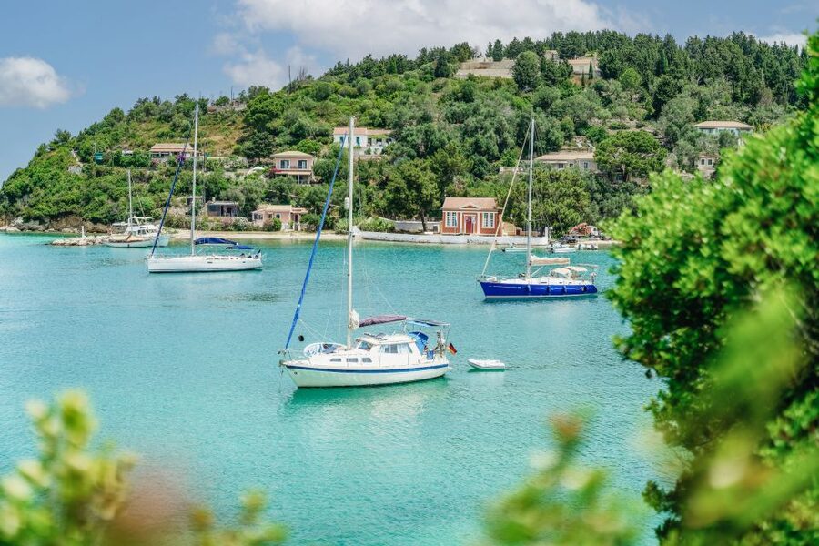 From Corfu Island: Antipaxos & Paxos Blue Caves Boat Cruise - Transfers, Meeting Points, and Timing