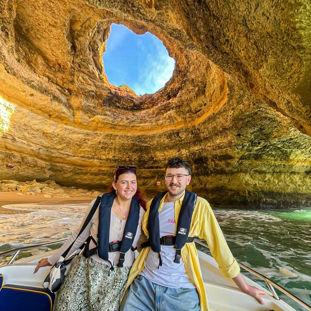 From Faro: Boat trip to Benagil Cave & Praia da Marinha - Boarding the boat at Benagil