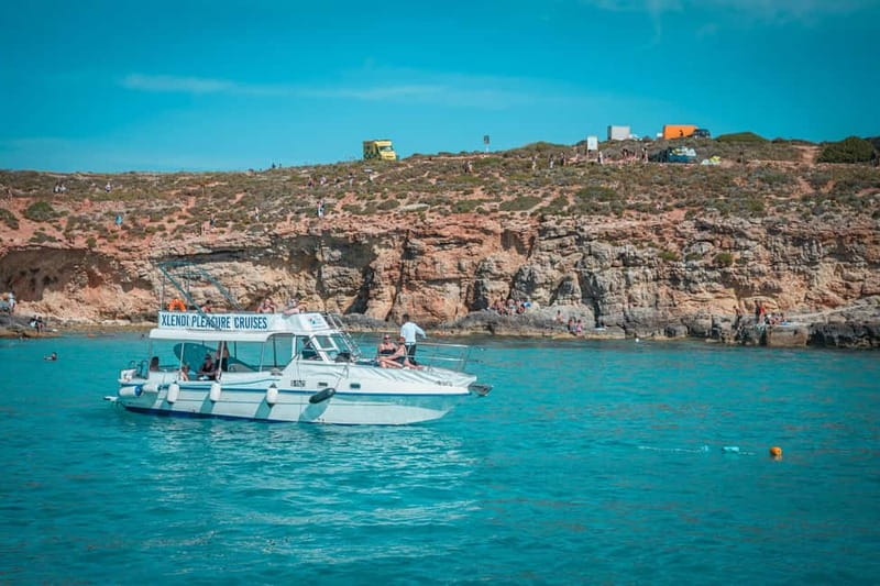 From Gozo:Around Comino, Blue Lagoon, Crystal Lagoon & Caves - A four-hour view of Comino from Gozo
