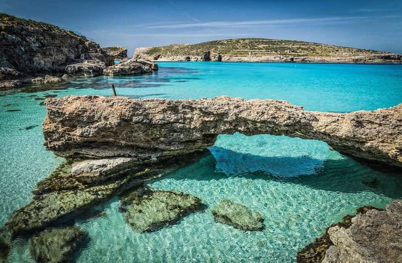 From Gozo:Around Comino, Blue Lagoon, Crystal Lagoon & Caves - Crystal Lagoon and clear water swimming
