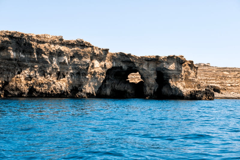 From Gozo:Around Comino, Blue Lagoon, Crystal Lagoon & Caves - Comino’s caves, bays, and film-set tower