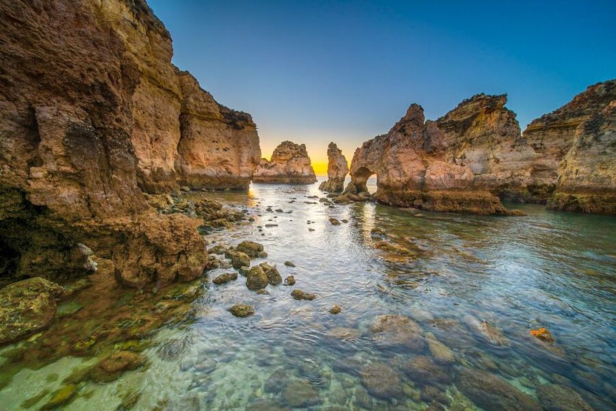 From Lagos: 2.5-Hour Guided Coastal Boat Tour & Grotto Visit - Shade, drinks, music, and a toilet onboard