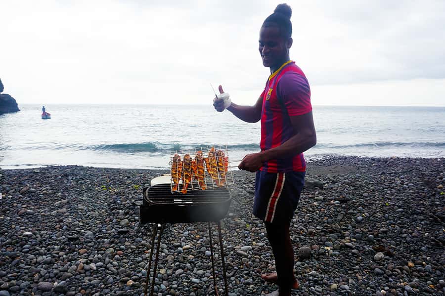 From Praia: Boat Trip, Snorkeling, Cave & BBQ on the Beach - Reading Santiago’s volcanic coast from the water