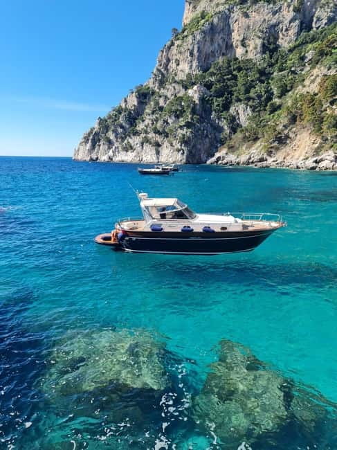 From Sorrento: Capri Boat Tour with Blue Grotto Visit - What the guide adds to the day
