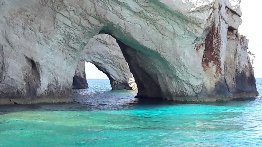 From St.Nikolaos: Boat Cruise to Navagio Beach & Blue Caves - The Blue Caves and swim stop
