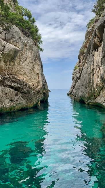 From Vlore: Blue Cave and Grama Bay Adventures - Sant Andreas Bay closes the swimming circuit