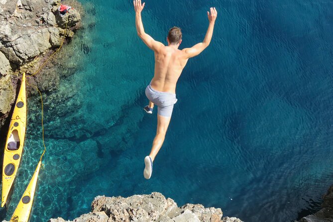 Full Day Kayaking and Snorkeling to Green Cave with GoPro photos - Swimming and cliff-jumping at Green Cave