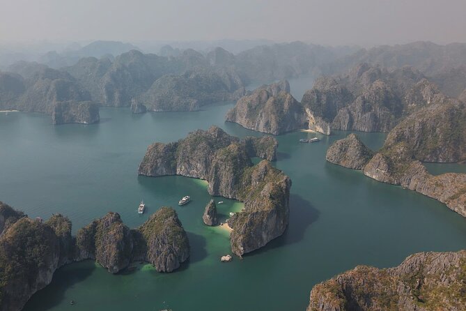 Ha Long Bay Cruise Day Tour - Cave, Kayaking, Swimming & Lunch - Lunch, fruit, and the sunset gathering