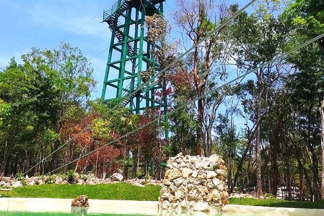Half-day Adventure: Cenote + Ziplining + ATV Tour - Ziplining above the trees