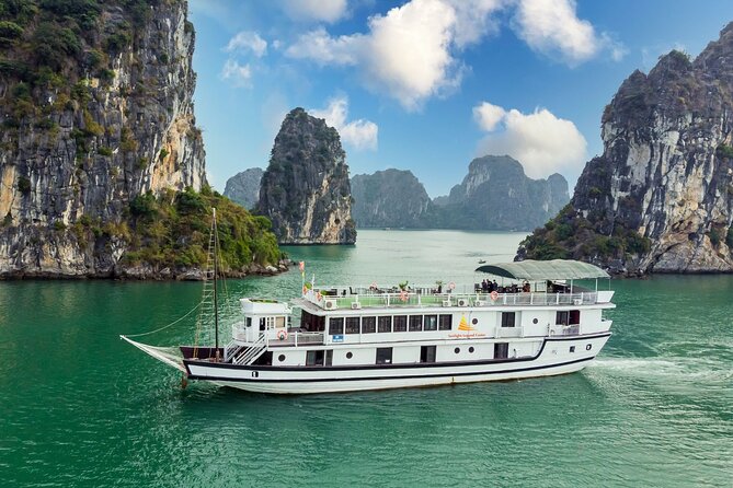 Halong Bay 2 Days 1 Night Traditional Boat - Day one begins with the famous cave