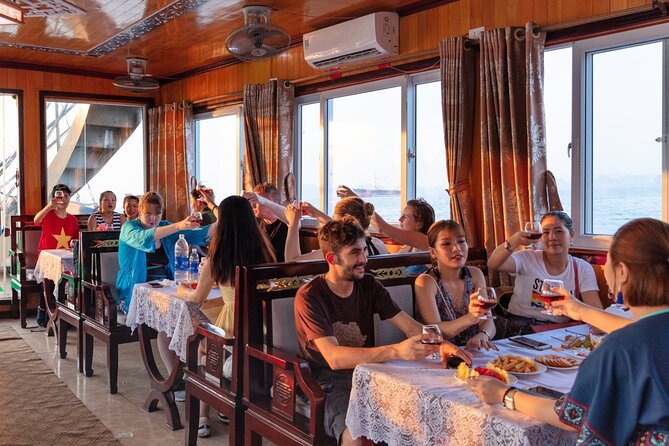 Halong Bay Day Tour With Titop Island, Cave, Kayak & Lunch - Sung Sot Cave and the first major walk
