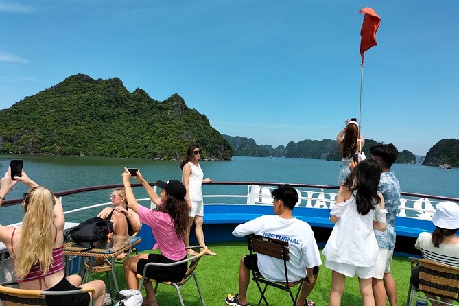 Halong Bay Day Tour With Titop Island, Cave, Kayak & Lunch - The return cruise and sunset snack