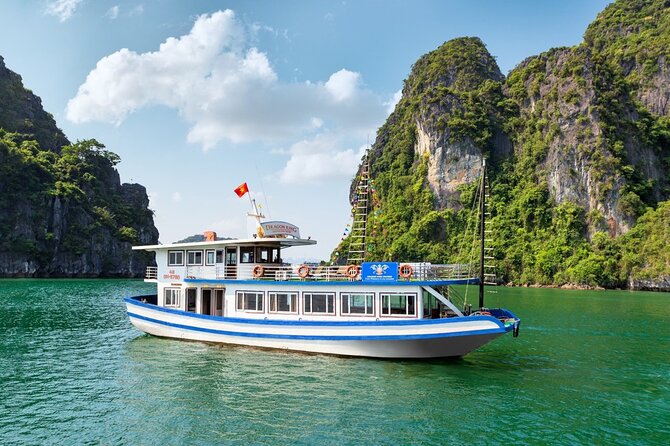 Halong Bay Day Tour With Titop Island, Cave, Kayak & Lunch - Boarding at Tuan Chau Island and settling into the cruise