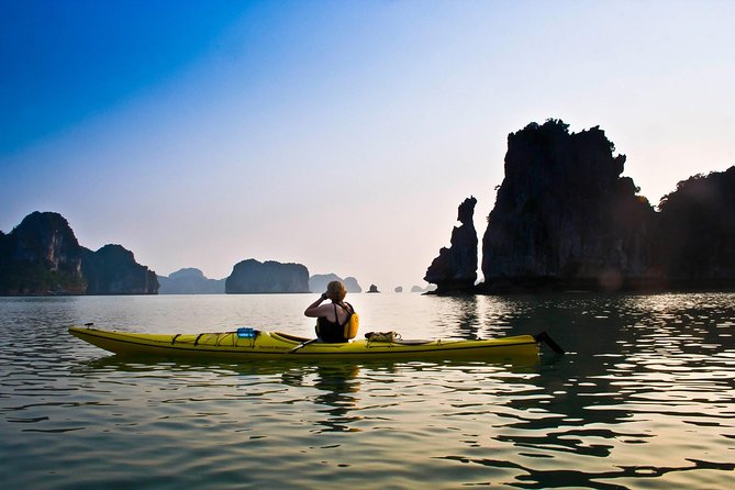 Halong Bay Full Day With Cave, Kayaking And Swimming - Highway Transfer - Guides, group size, and how the day feels