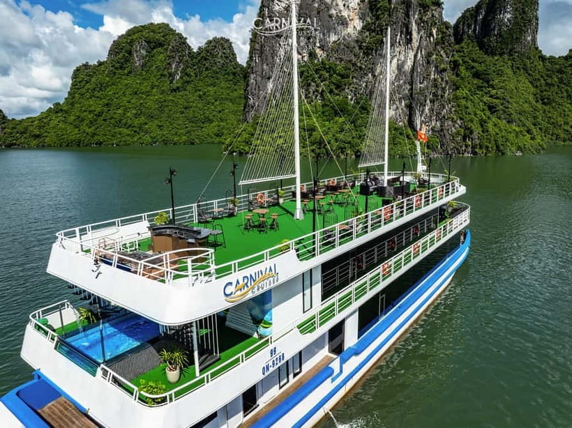 Halong Bay: Luxury Day Cruise, Caves, Kayak & Buffet Lunch - Titov Island, swimming, and the climb for the view